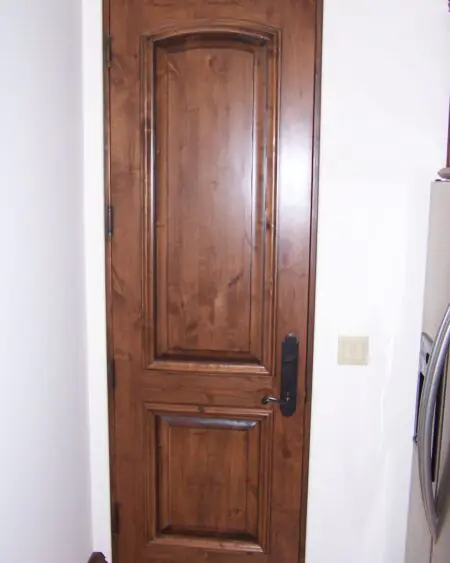 Applied molding door with decorative panel detailing